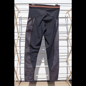 Bronze and silver accented Zumba leggings.